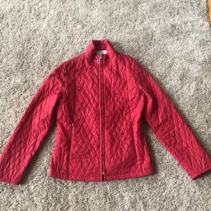 Red nylon jacket with two front zipper pockets